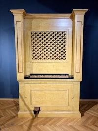 an old wooden organ in a museum